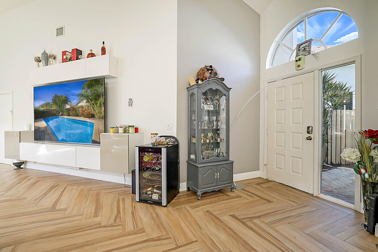 6655 Northwest 25th Avenue Boca Raton, FL 33496 - Photo 3 of 33 a view of livingroom with furniture and wooden floor