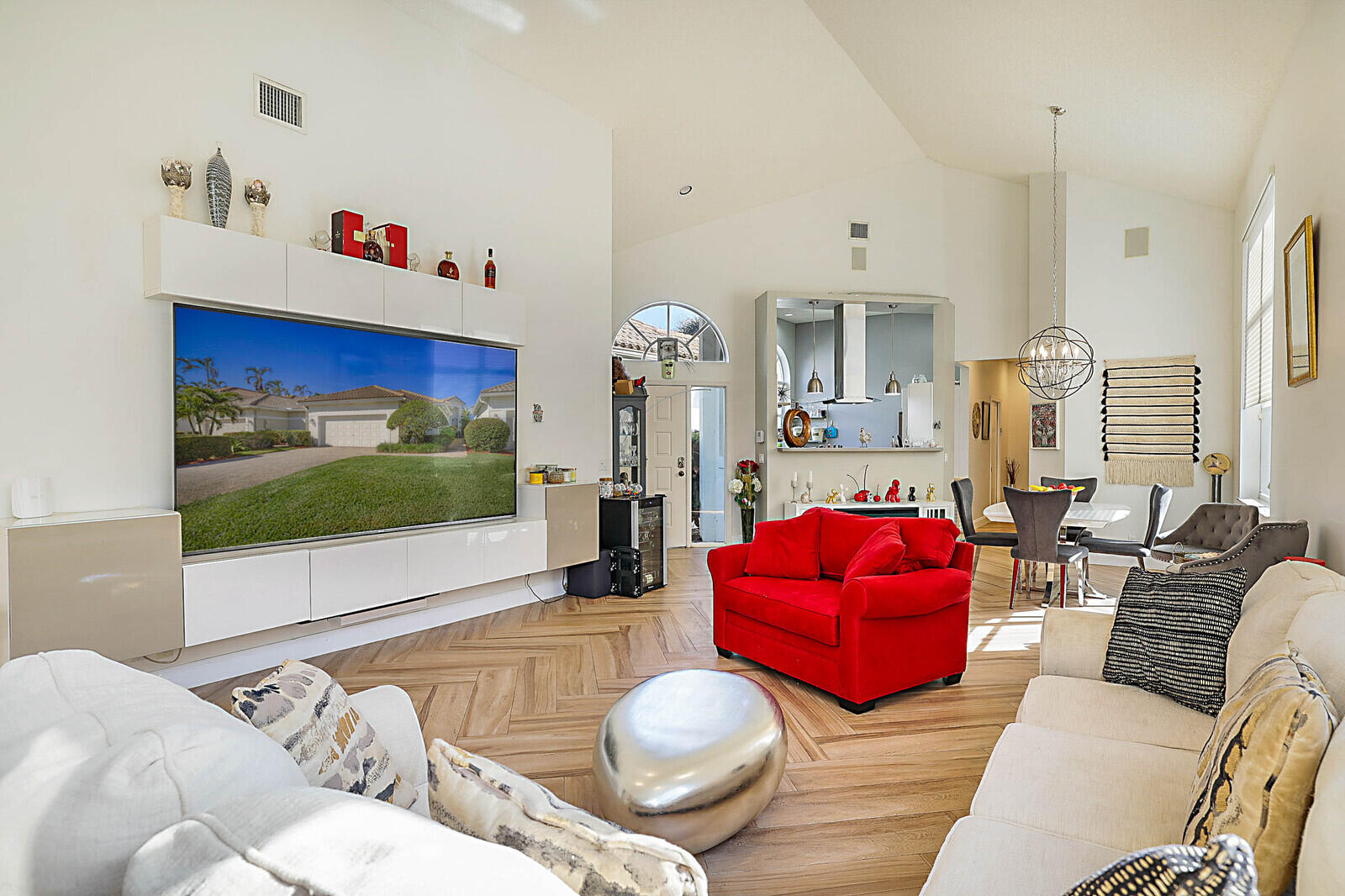 6655 Northwest 25th Avenue Boca Raton, FL 33496 - Photo 4 of 33 a living room with furniture and a flat screen tv