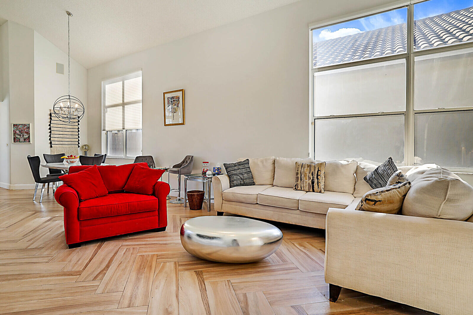 6655 Northwest 25th Avenue Boca Raton, FL 33496 - Photo 7 of 33 a living room with furniture and a window