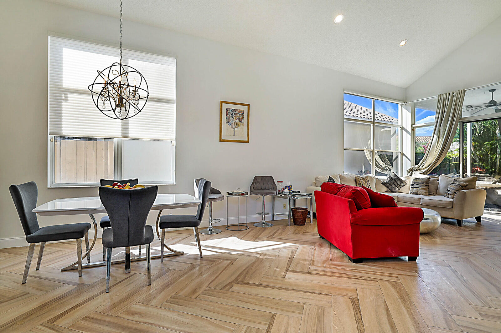 6655 Northwest 25th Avenue Boca Raton, FL 33496 - Photo 8 of 33 a view of a livingroom with furniture window and wooden floor