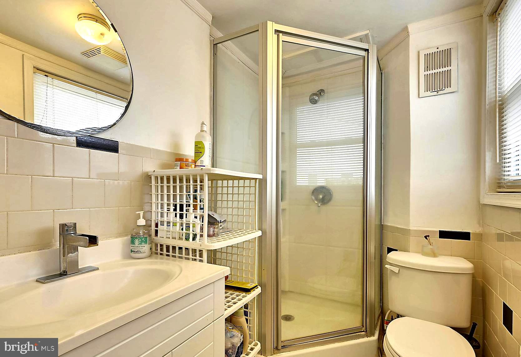 1628 Oldtown Road Edgewater, MD 21037 - Photo 18 of 40 Main Level Tiled Full Bath with Capsule Shower