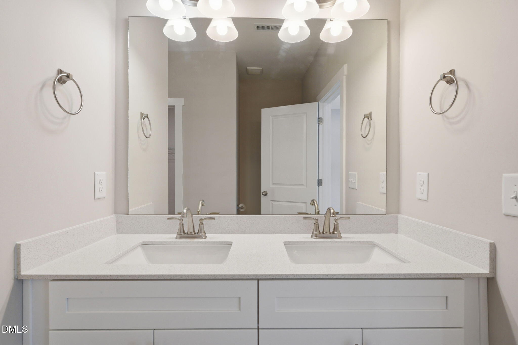 161 Tupelo Dr Spring Spring Hope, NC 27882 - Photo 17 of 28 a bathroom with a sink vanity and a mirror