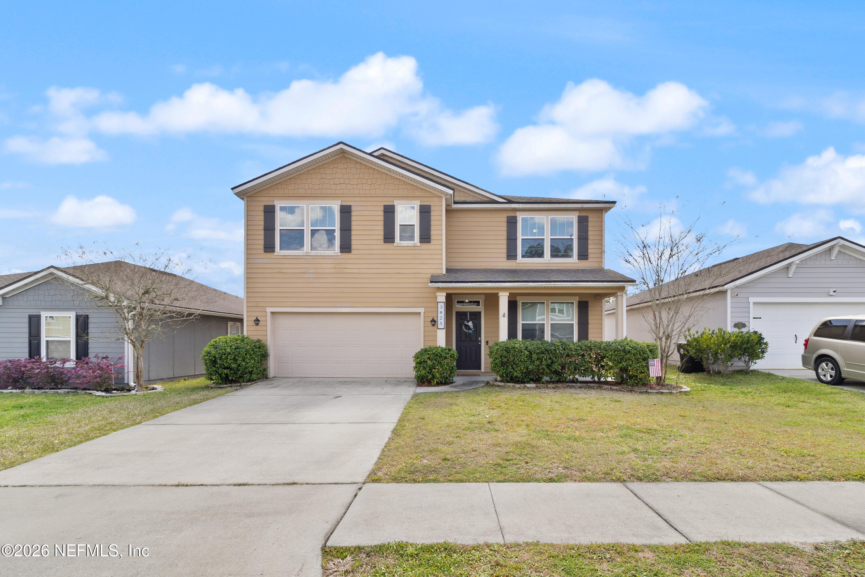 3825 Bronco Road Middleburg, FL 32068 - Photo 1 of 18 a front view of a house with garden