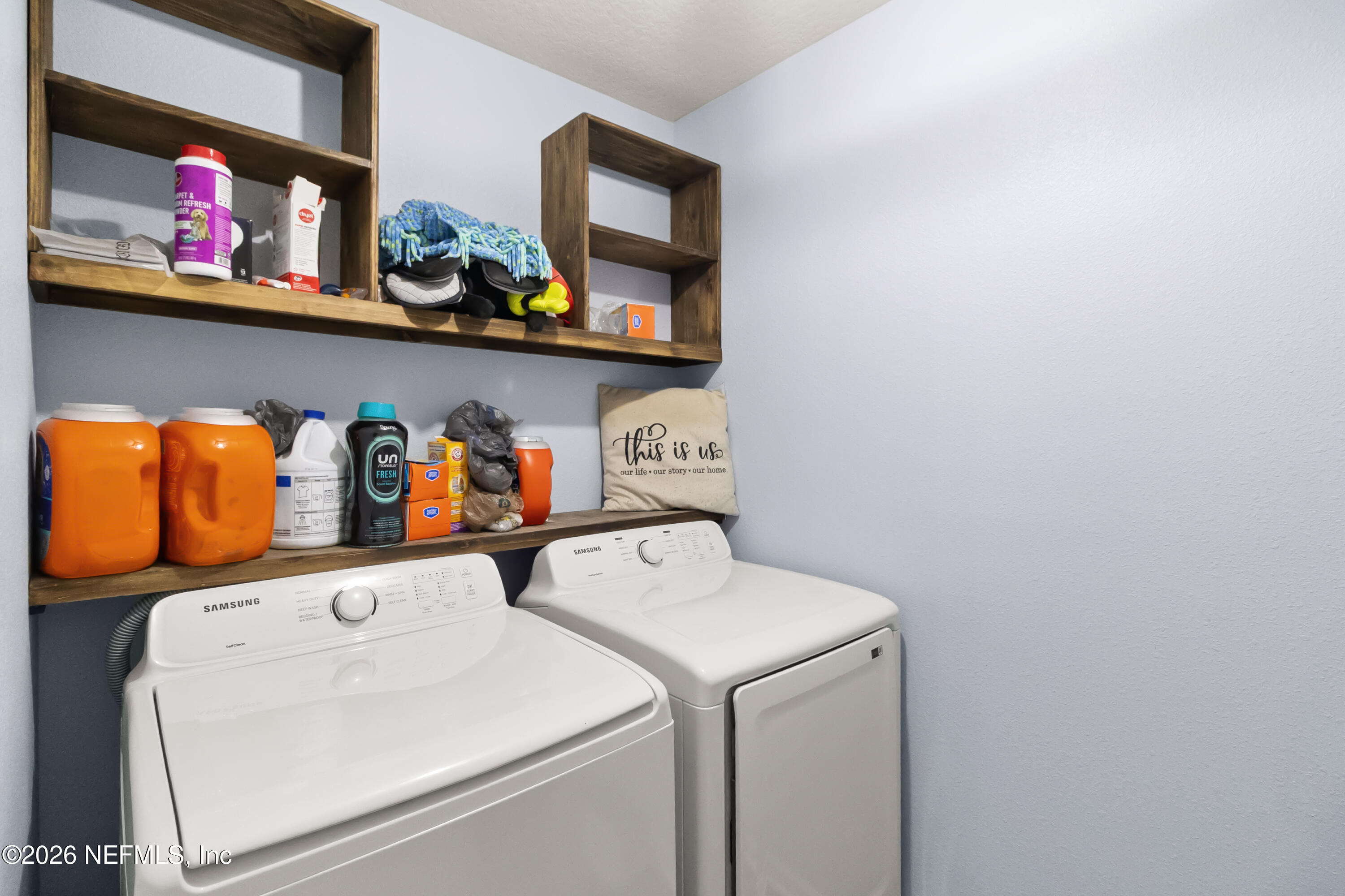3825 Bronco Road Middleburg, FL 32068 - Photo 13 of 18 a utility room with dryer and washer