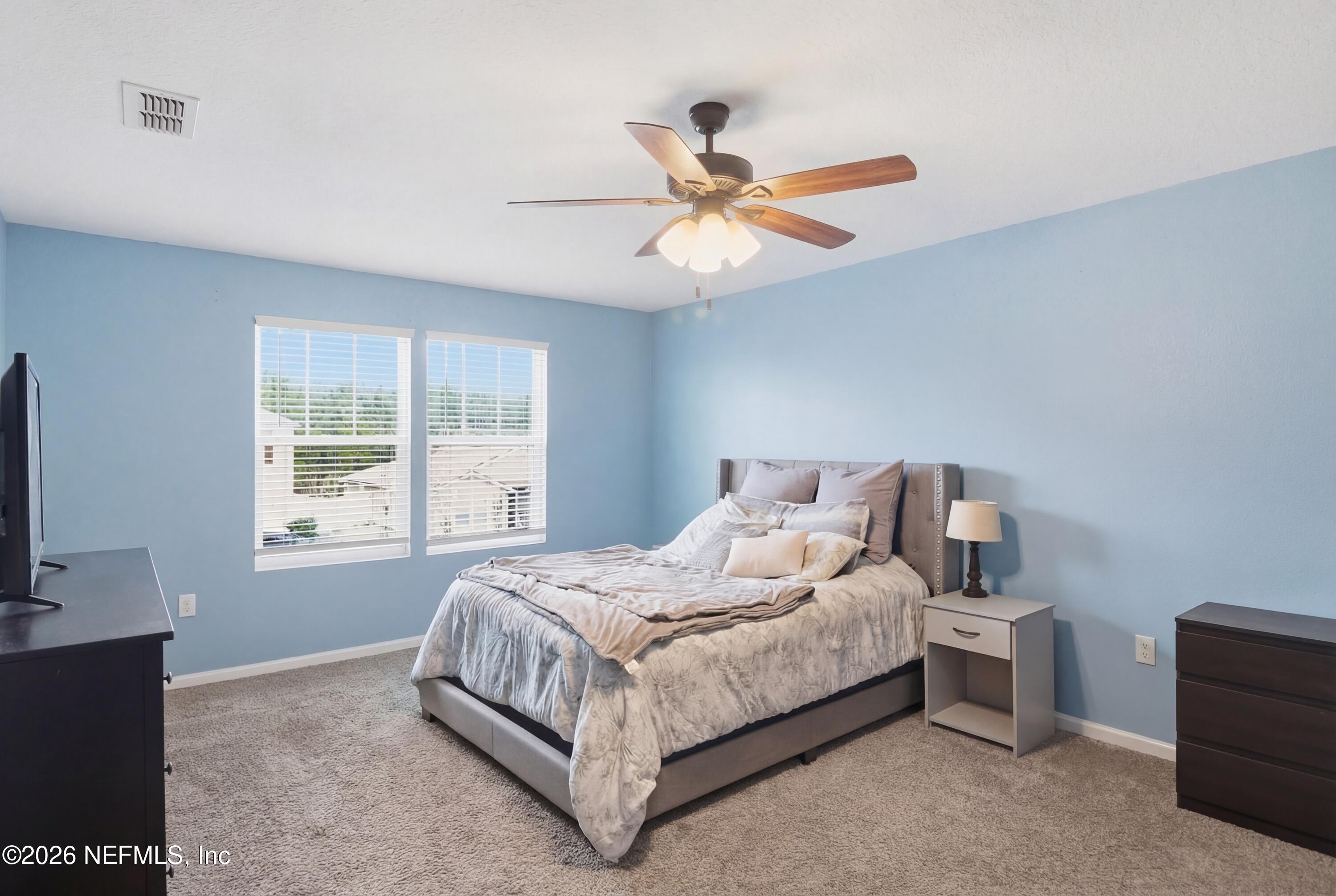 3825 Bronco Road Middleburg, FL 32068 - Photo 17 of 18 a bedroom with a bed and a window