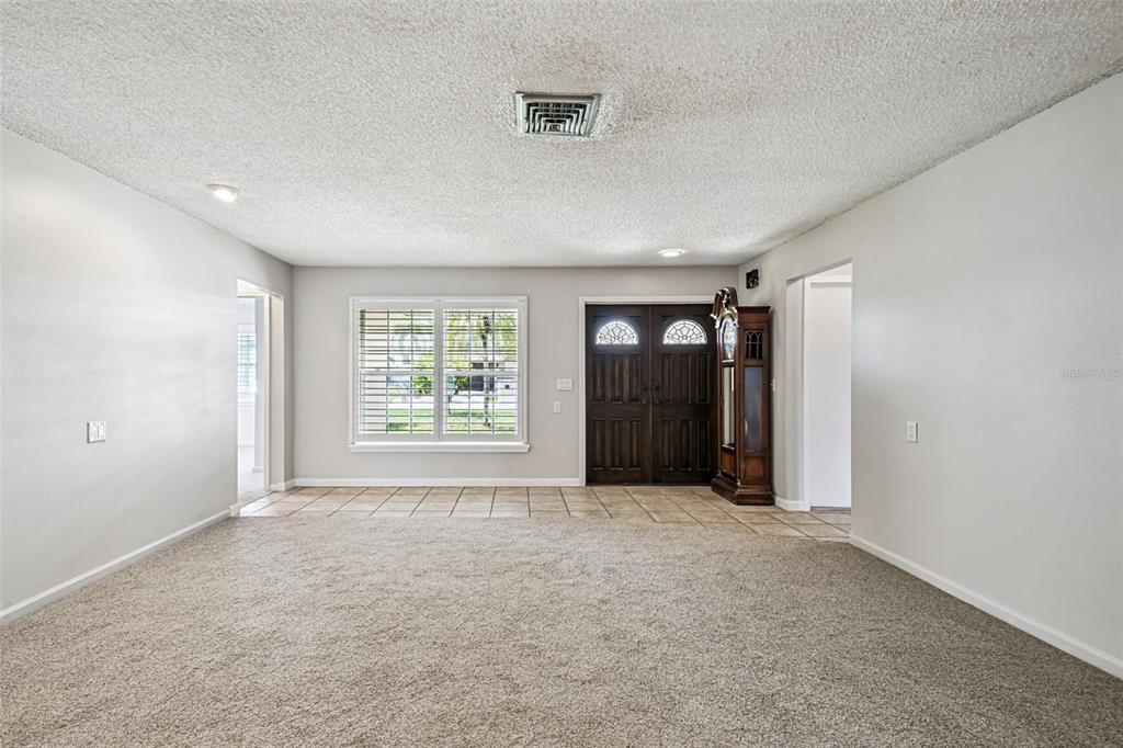 529 Johns Pass Avenue Madeira Beach, FL 33708 - Photo 19 of 100 an empty room with windows and closet