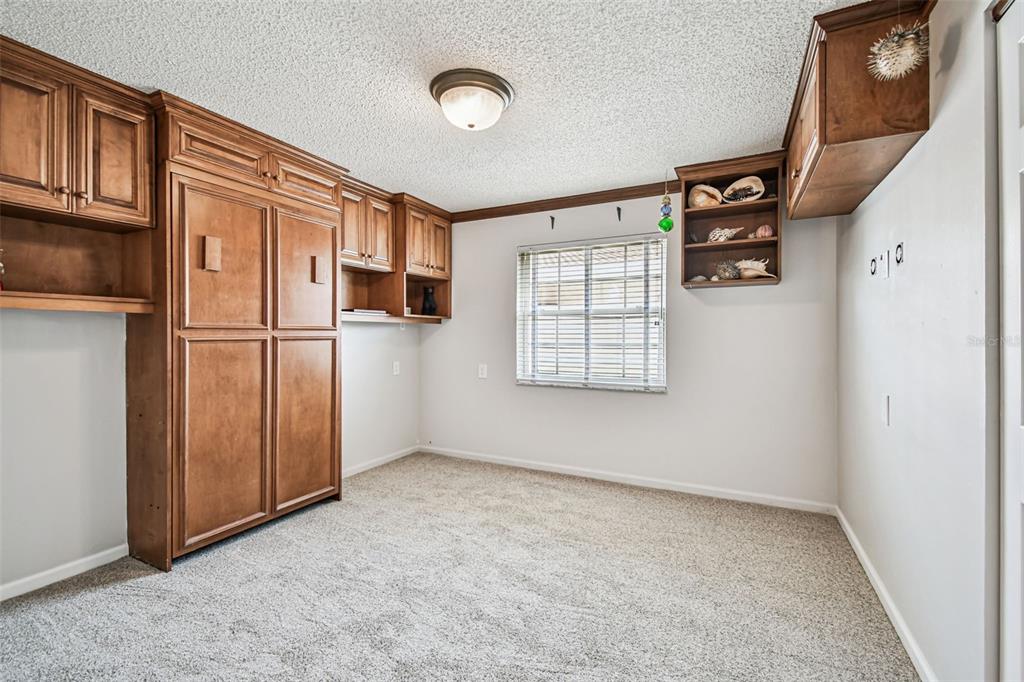 529 Johns Pass Avenue Madeira Beach, FL 33708 - Photo 57 of 100 a view of an empty room with a kitchen