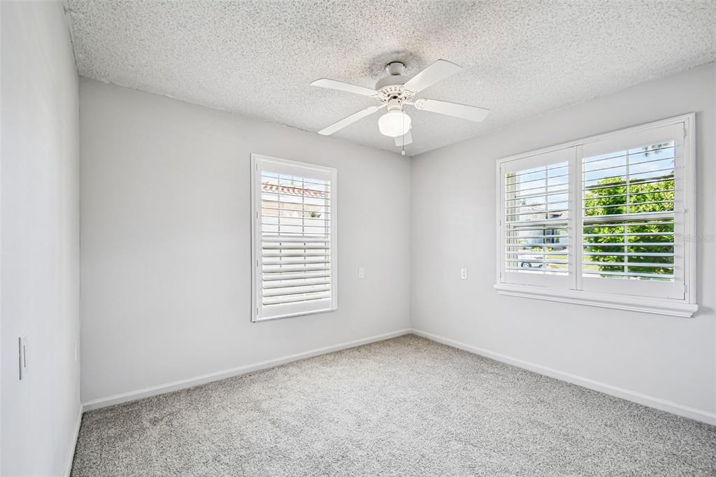529 Johns Pass Avenue Madeira Beach, FL 33708 - Photo 61 of 100 a view of an empty room with a window