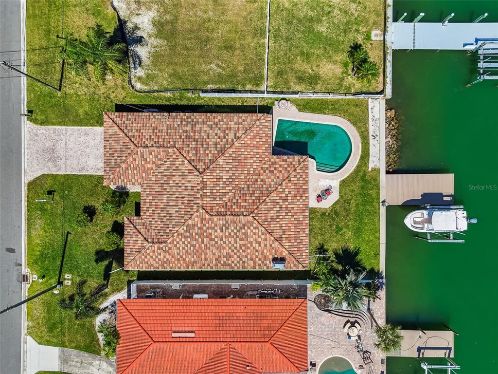 529 Johns Pass Avenue Madeira Beach, FL 33708 - Photo 83 of 100 an aerial view of a house having outdoor space