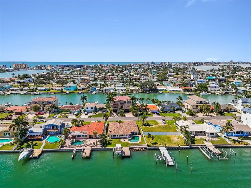 529 Johns Pass Avenue Madeira Beach, FL 33708 - Photo 86 of 100 an aerial view of a houses with a lake view