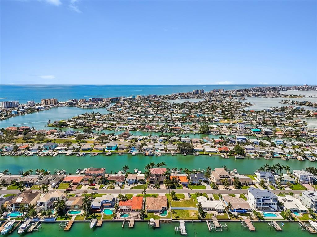 529 Johns Pass Avenue Madeira Beach, FL 33708 - Photo 91 of 100 an aerial view of a city with lots of residential buildings