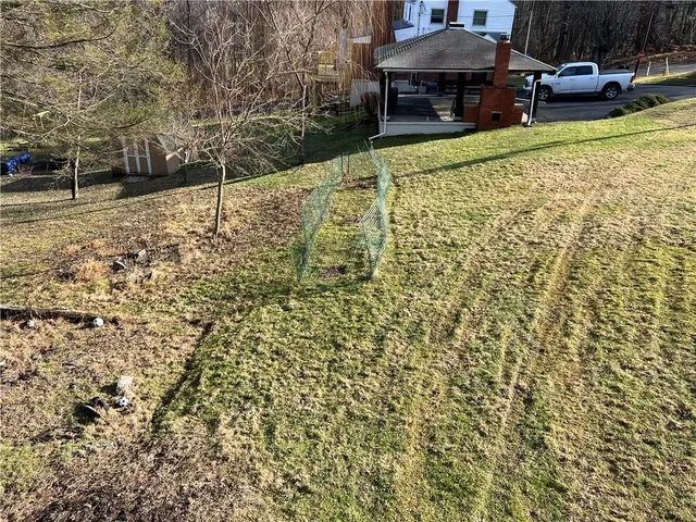 a view of a backyard with a garden