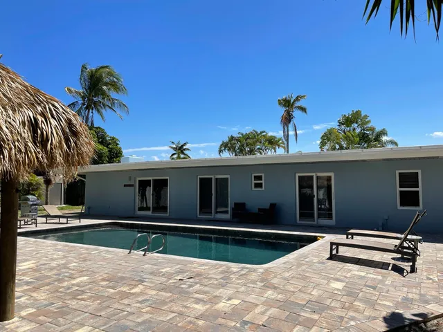 a view of a house with a swimming pool
