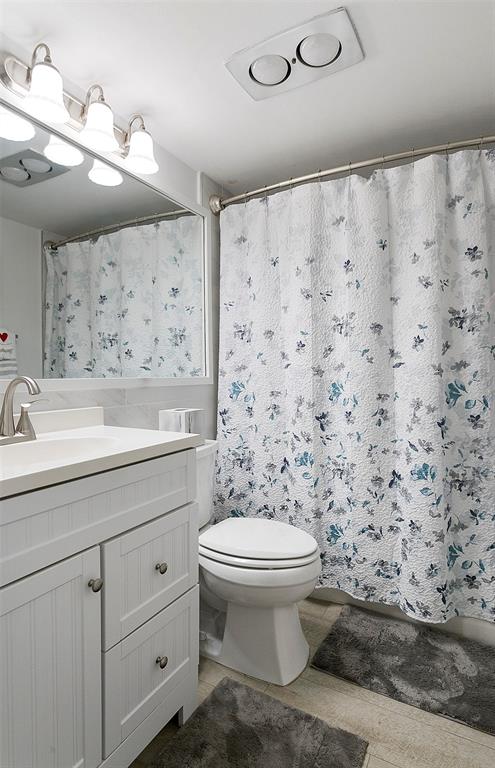 259 South Cypress Road, Unit 546 Pompano Beach, FL 33060 - Photo 18 of 23 a bathroom with a sink toilet and shower