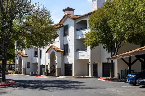 a front view of a building with street view