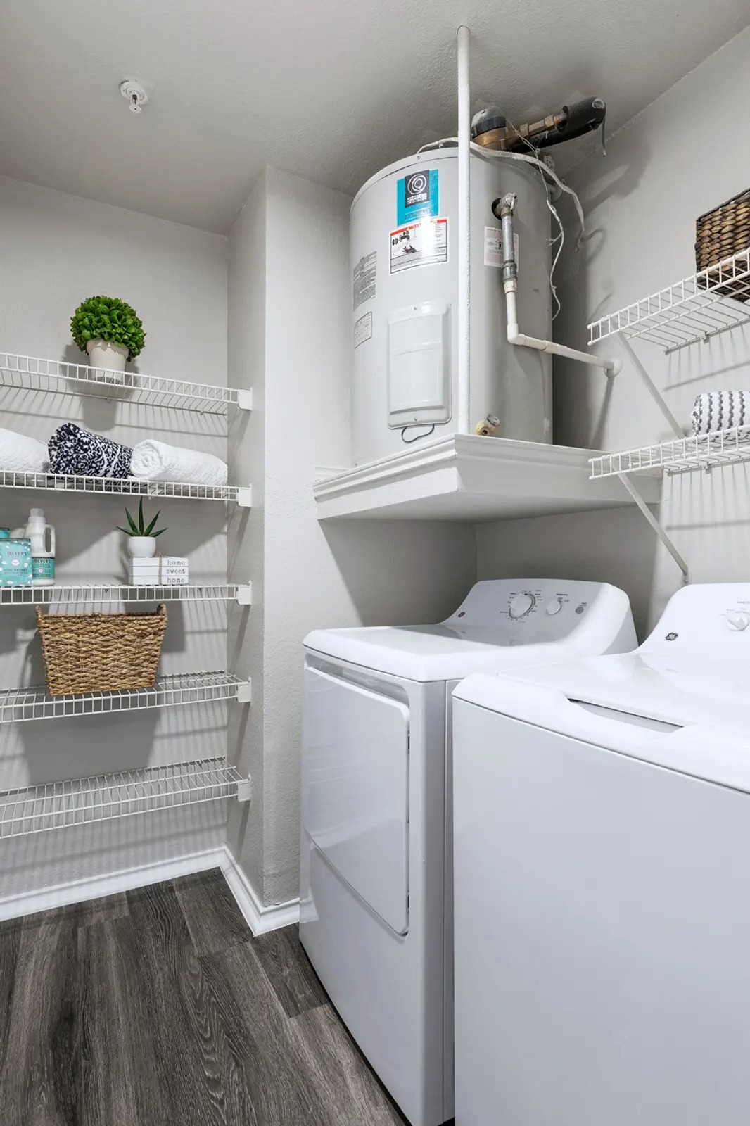 3201 Duval Road, Unit 131331 Austin, TX 78759 - Photo 13 of 22 a view of storage and utility room with washer and dryer