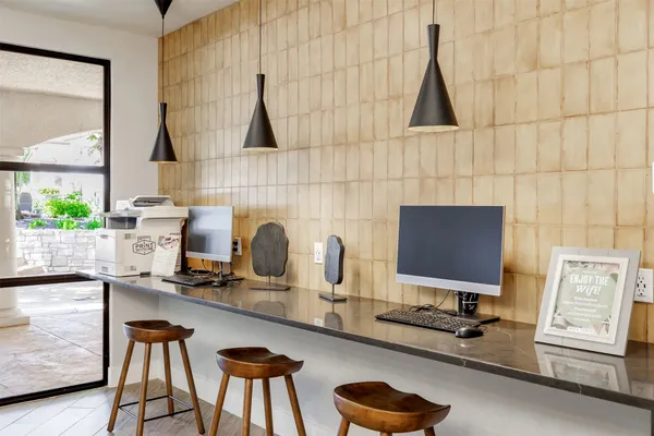 a room with furniture and a flat screen tv