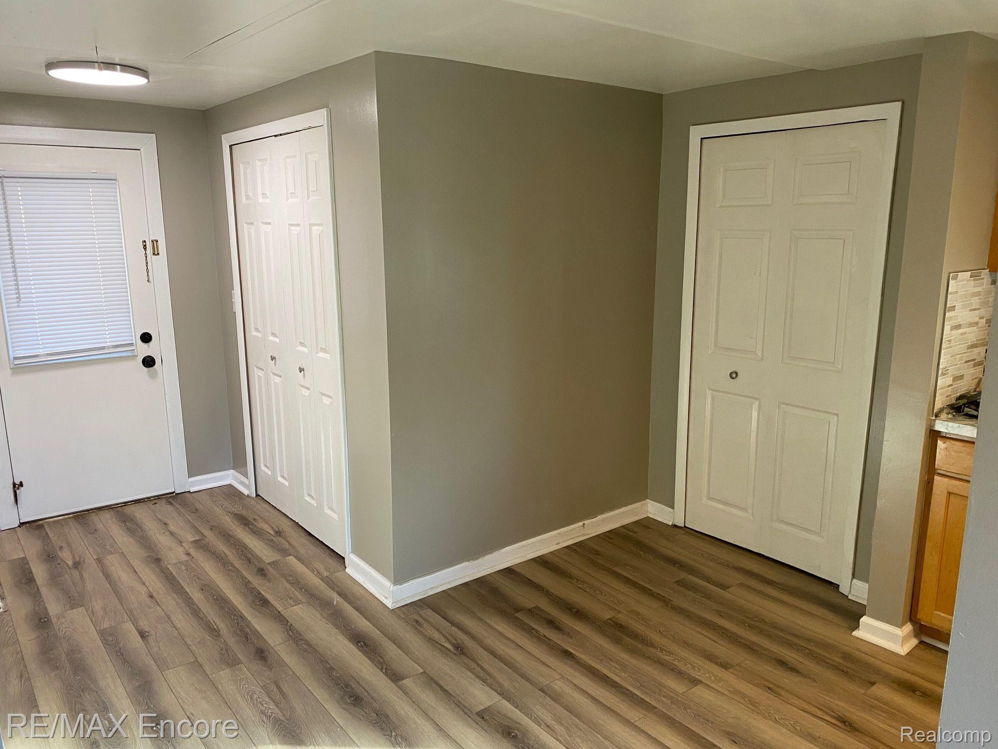 4852 Sashabaw Road Clarkston, MI 48346 - Photo 9 of 15 You will love these floors!