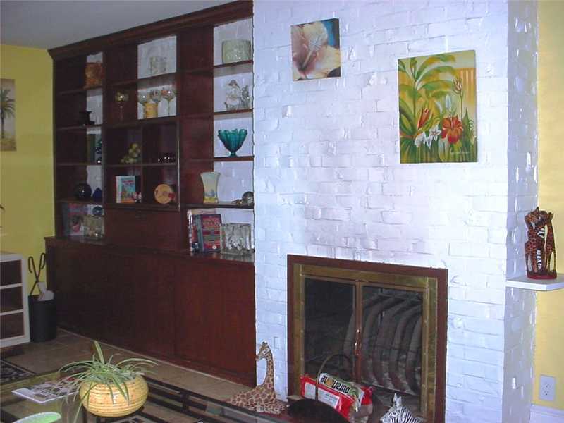 162 Lyndon Road Cranston, RI 02905 - Photo 5 of 14 Other. Built-ins and fireplace in Sunroom