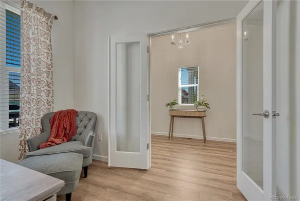 a living room with furniture and a window
