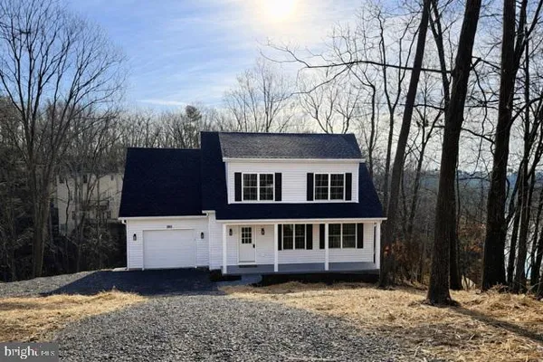 a view of a backyard with hardwood