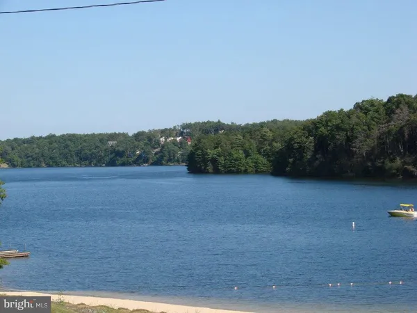 a view of lake with mountain