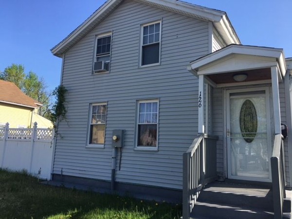 126 Allen Street Springfield, MA 01108 - Photo 1 of 10 a view of a brick house with many windows