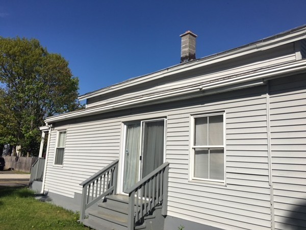 126 Allen Street Springfield, MA 01108 - Photo 2 of 10 a view of a house with a roof deck