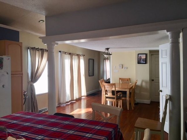 126 Allen Street Springfield, MA 01108 - Photo 3 of 10 a view of a livingroom with furniture window and wooden floor