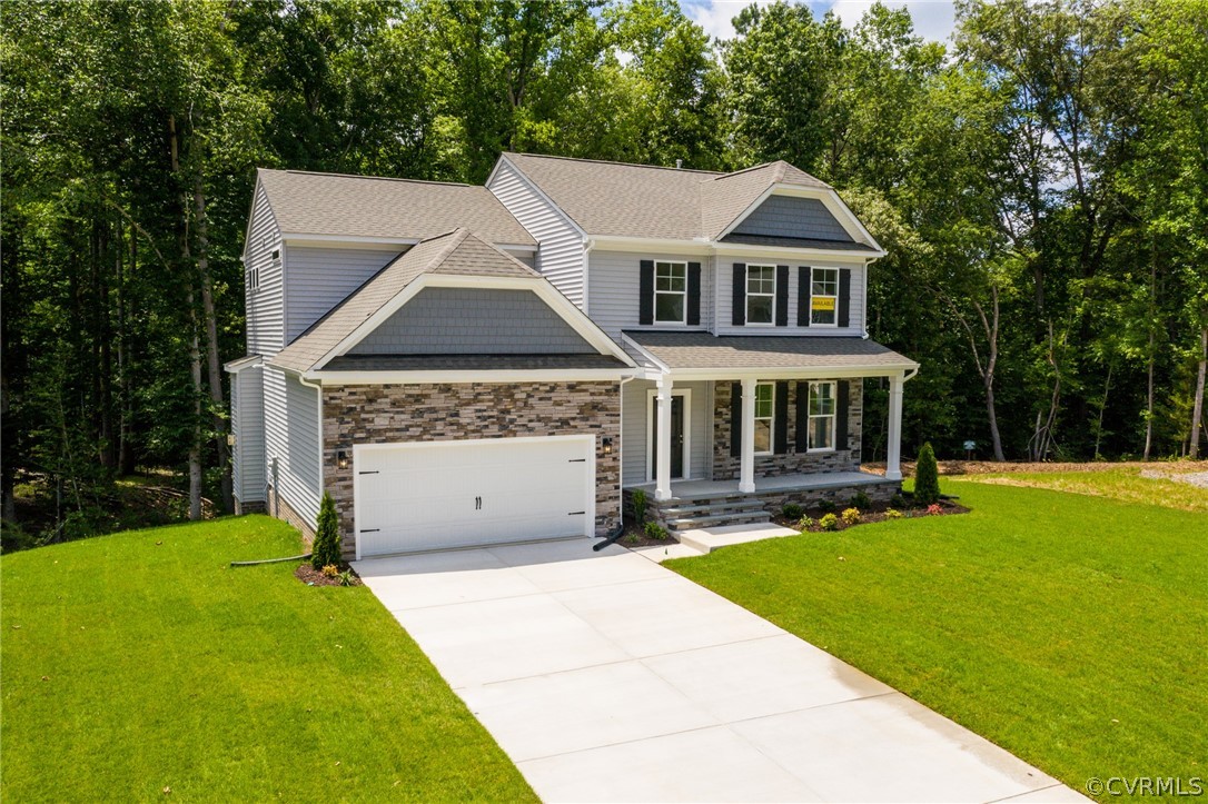 4113 Tosh Lane Chester, VA 23831 - Photo 2 of 47 a front view of a house with a yard