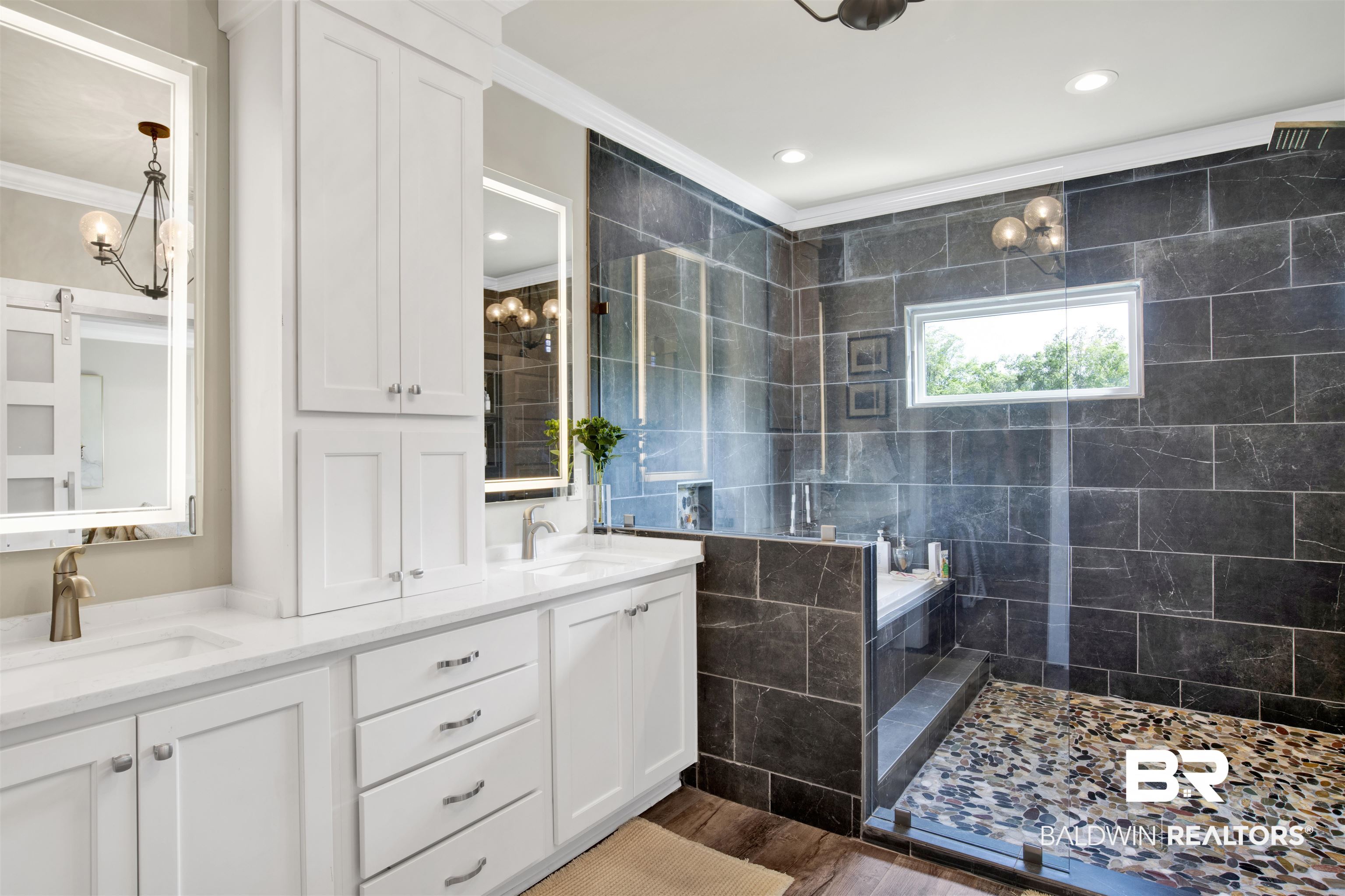 21621 Veranda Boulevard Fairhope, AL 36532 - Photo 15 of 51 Full bath featuring crown molding, double vanity, wood finished floors, a sink, and a tile shower