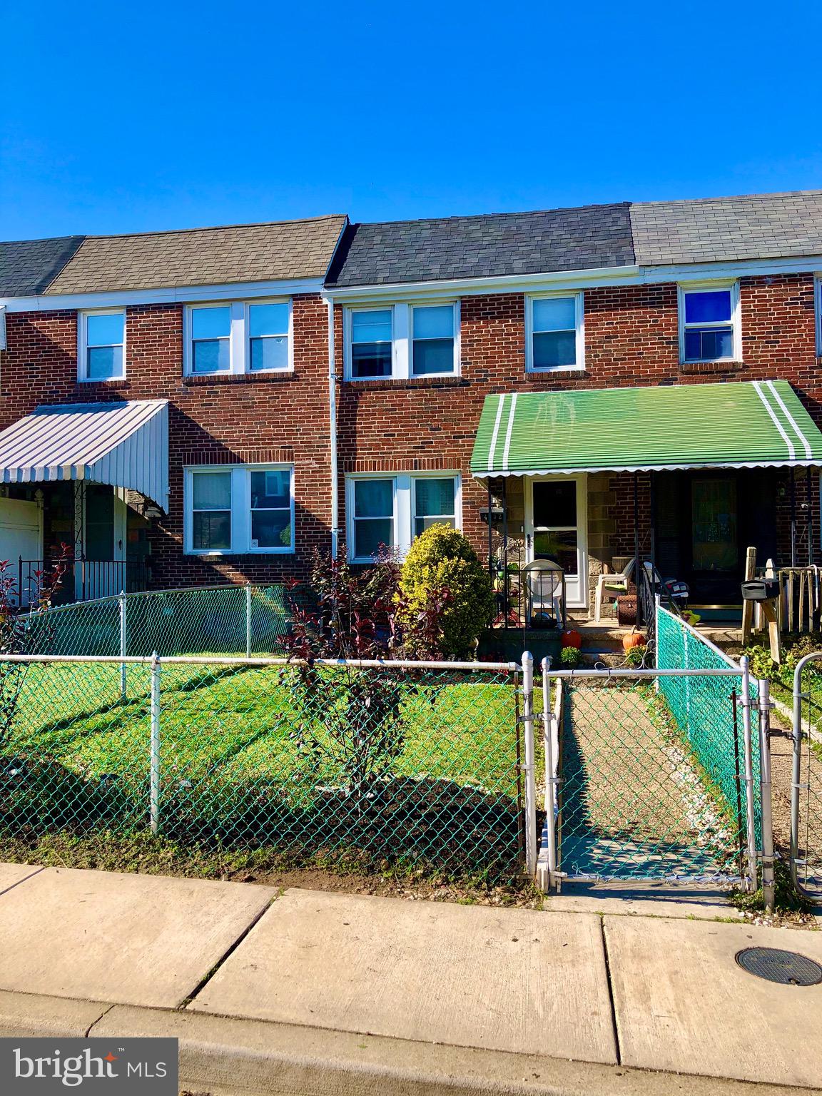 4302 Cortez Road Baltimore, MD 21225 - Photo 2 of 29 Fenced landscaped front yard