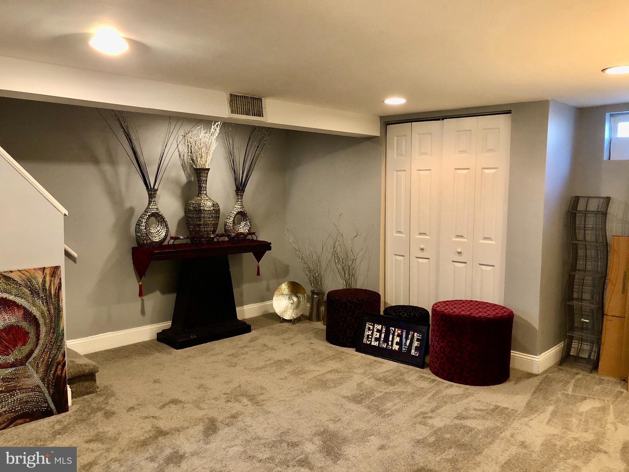 4302 Cortez Road Baltimore, MD 21225 - Photo 22 of 29 Finished basement with new carpet and paint