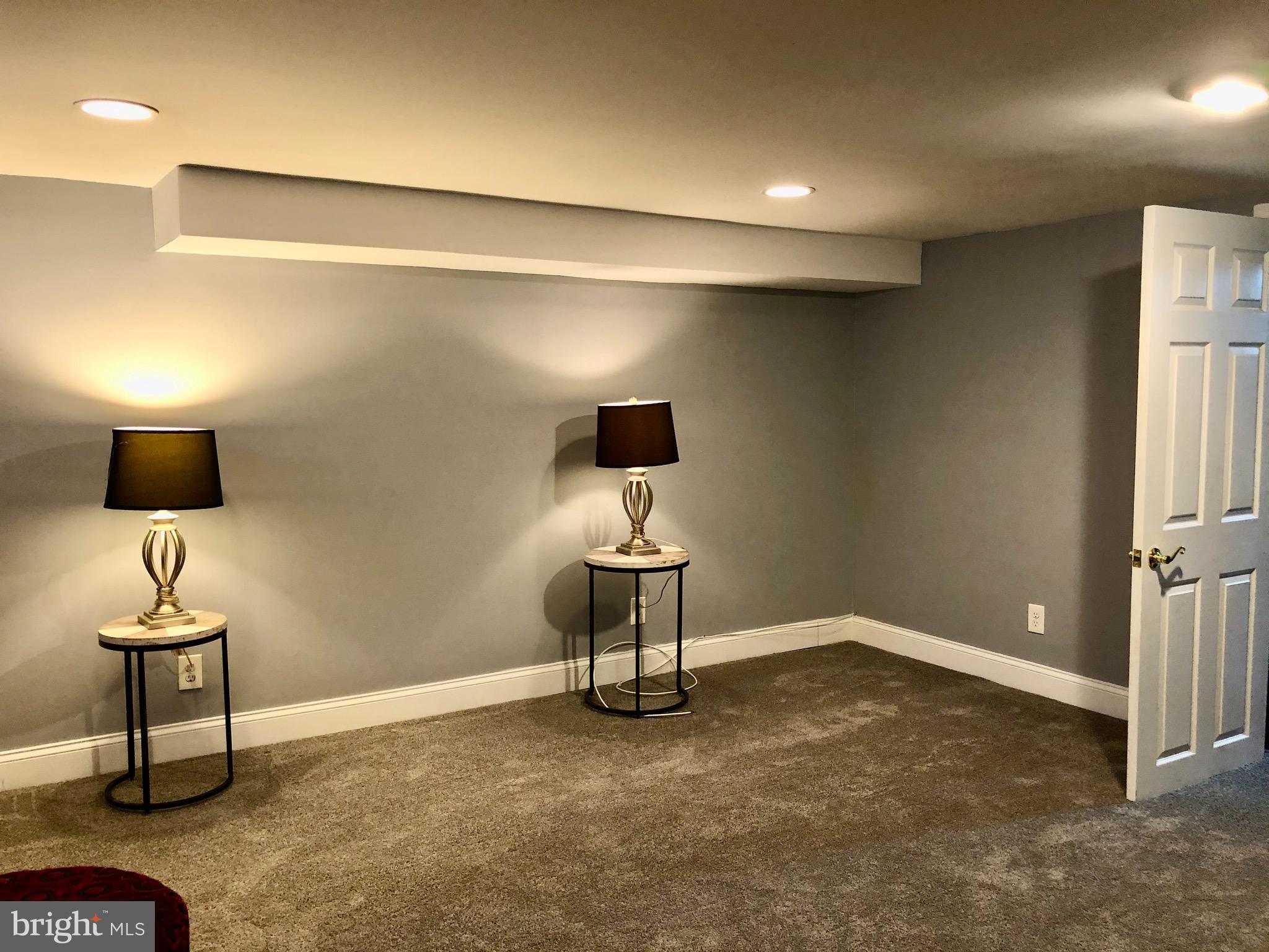 4302 Cortez Road Baltimore, MD 21225 - Photo 23 of 29 Finished basement with new carpet and paint