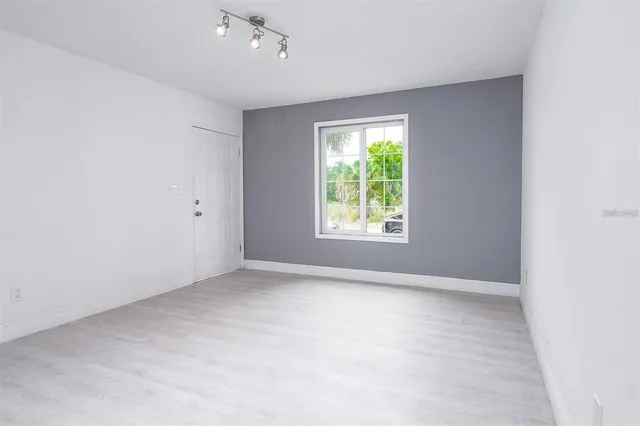 an empty room with windows