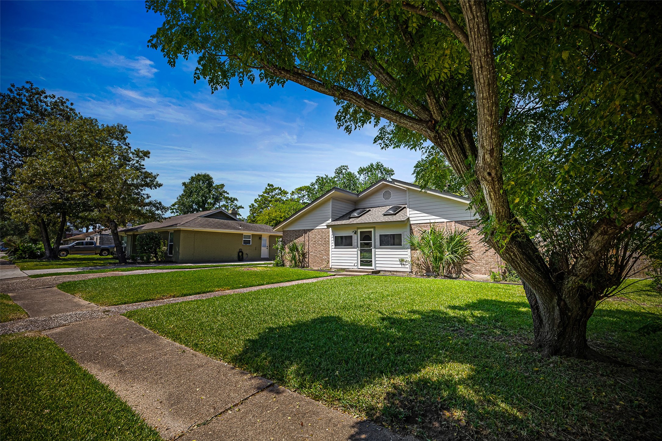 2519 Wood River Road Spring, TX 77373 - Photo 3 of 26 a front view of a house with a yard