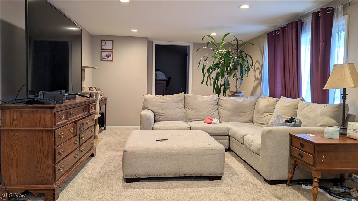 10951 Stump Road Minerva, OH 44657 - Photo 12 of 16 Living room featuring baseboards, recessed lighting, and light carpet