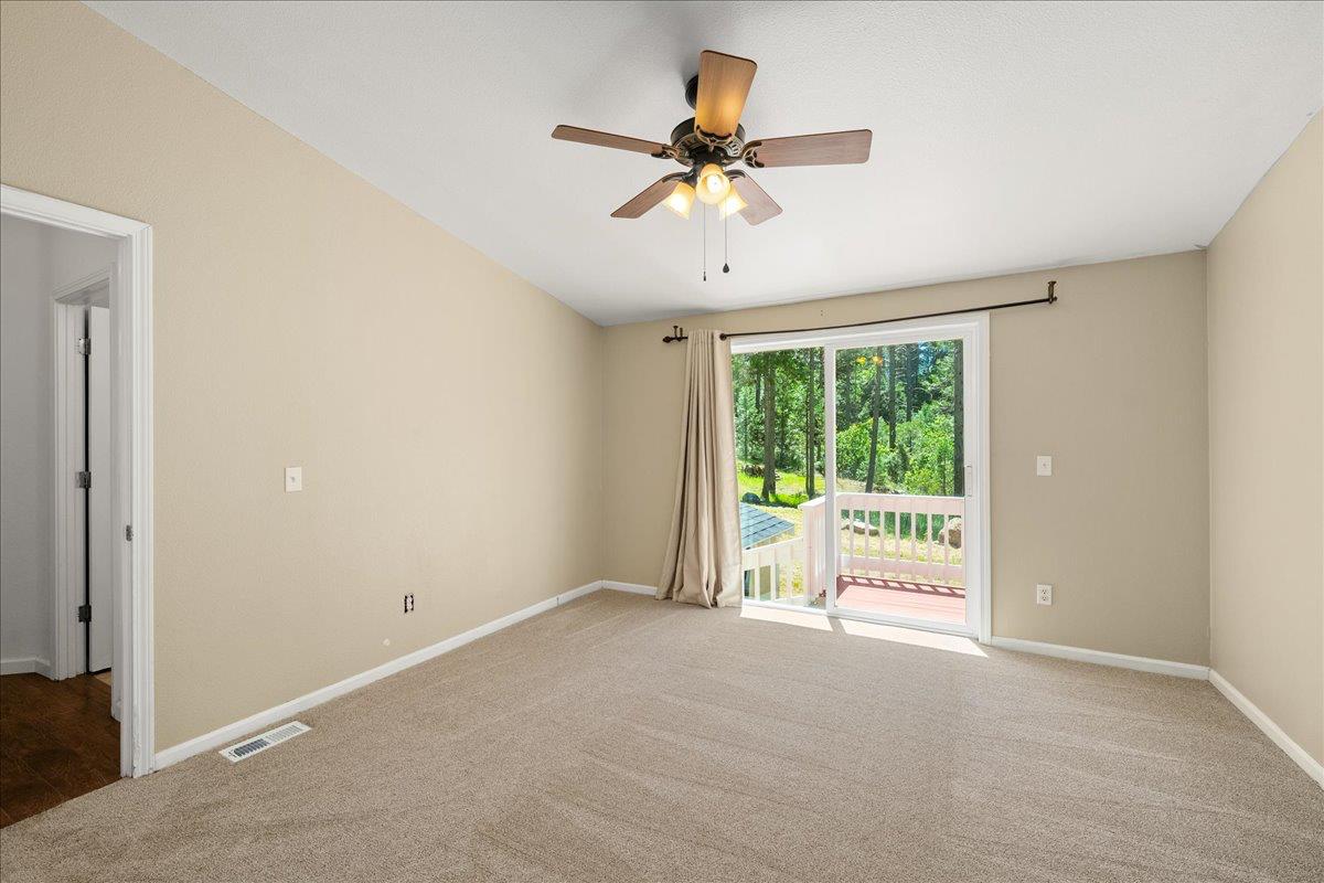 21819 Todd Valley Road Foresthill, CA 95631 - Photo 24 of 37 a view of a livingroom with a ceiling fan and window