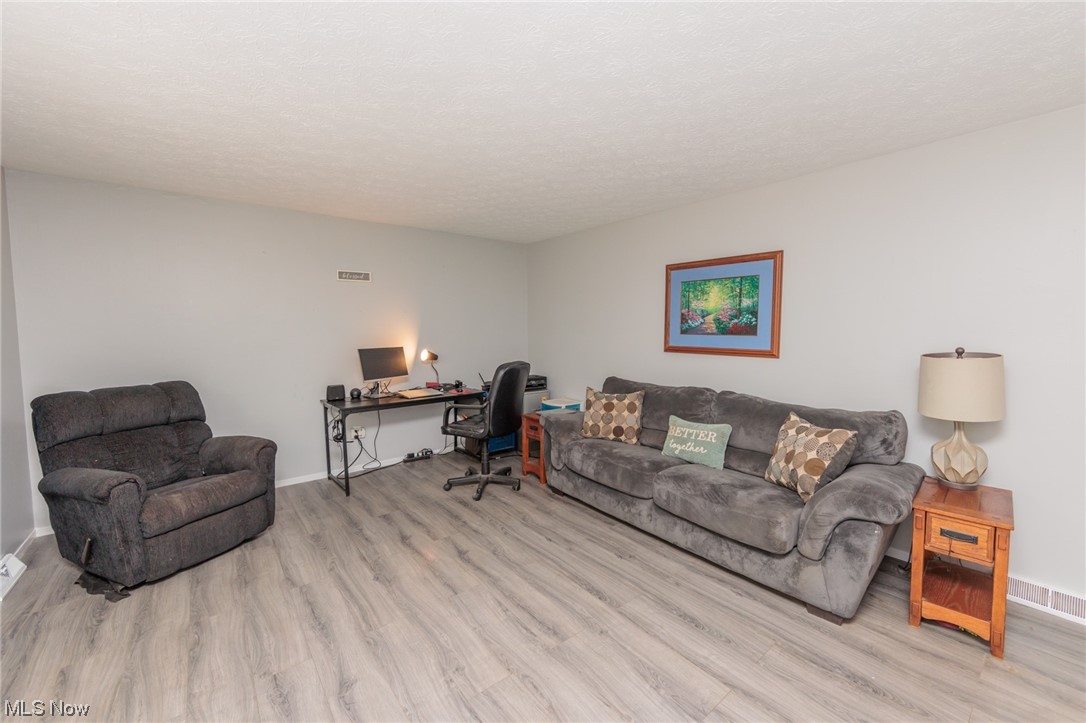 4560 Winchell Road Mantua, OH 44255 - Photo 5 of 35 Spacious Living Rm w/LVP Wood Floor