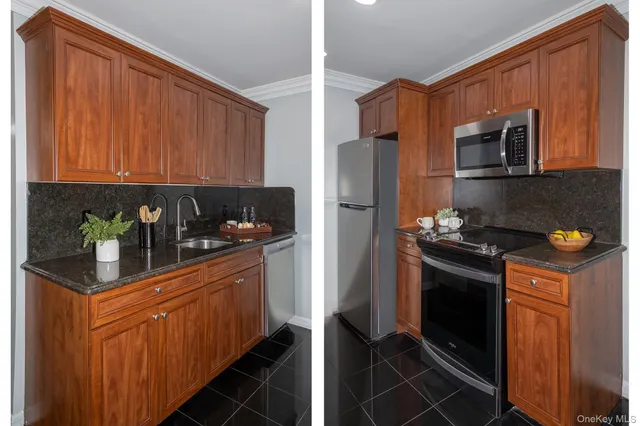 a kitchen with stainless steel appliances granite countertop a refrigerator and a stove top oven