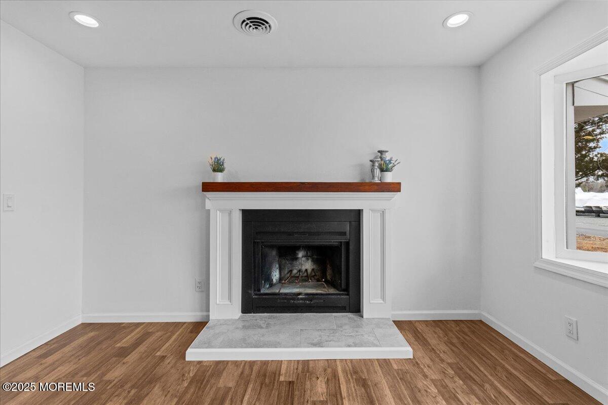 98 Marine Road Waretown, NJ 08758 - Photo 11 of 40 a living room with a fireplace