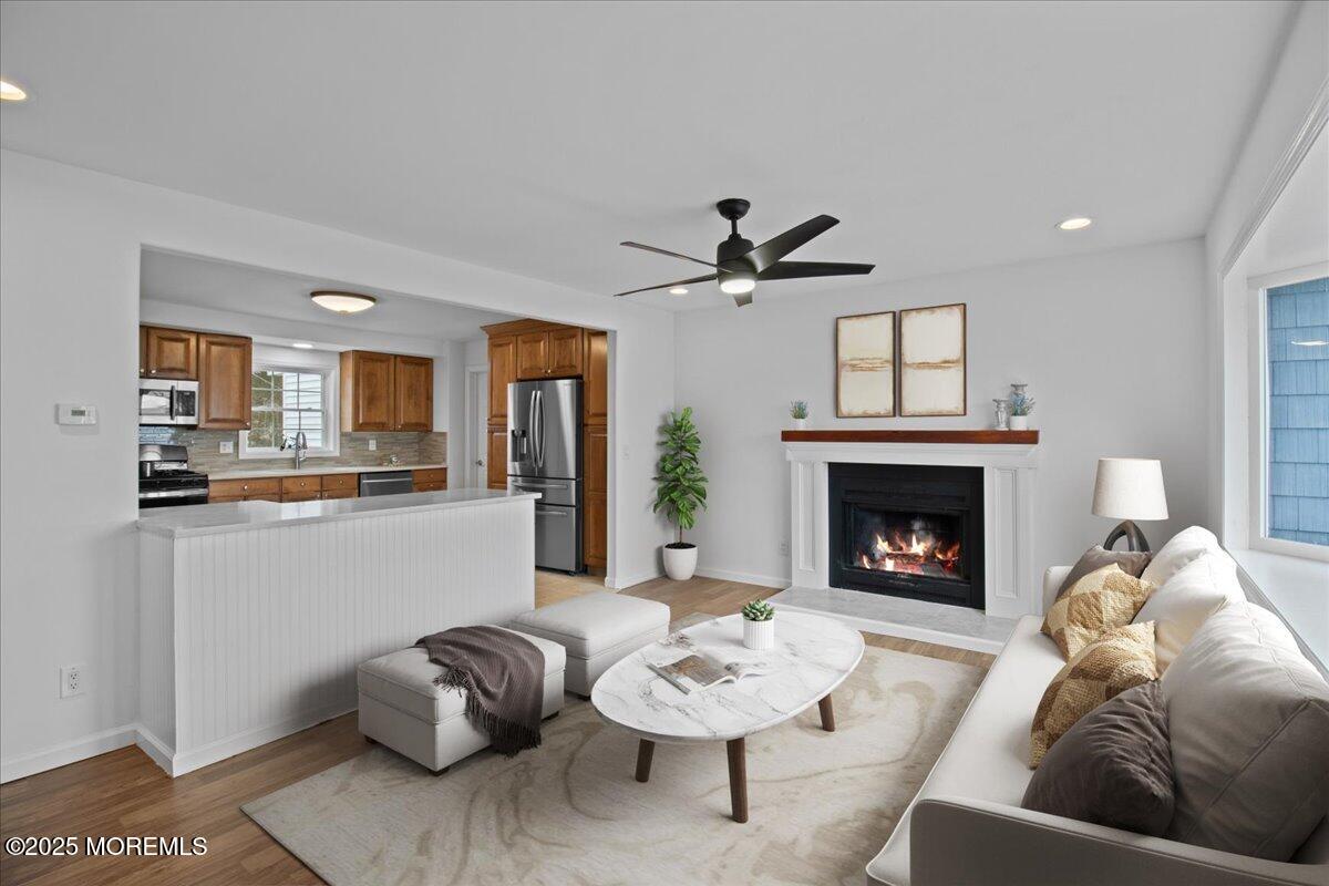 98 Marine Road Waretown, NJ 08758 - Photo 13 of 40 a living room with furniture and a fireplace