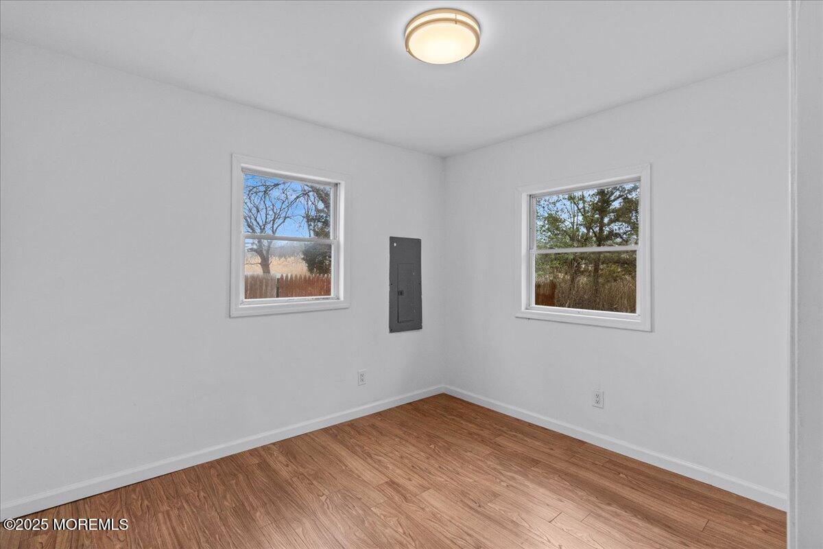 98 Marine Road Waretown, NJ 08758 - Photo 22 of 40 an empty room with windows