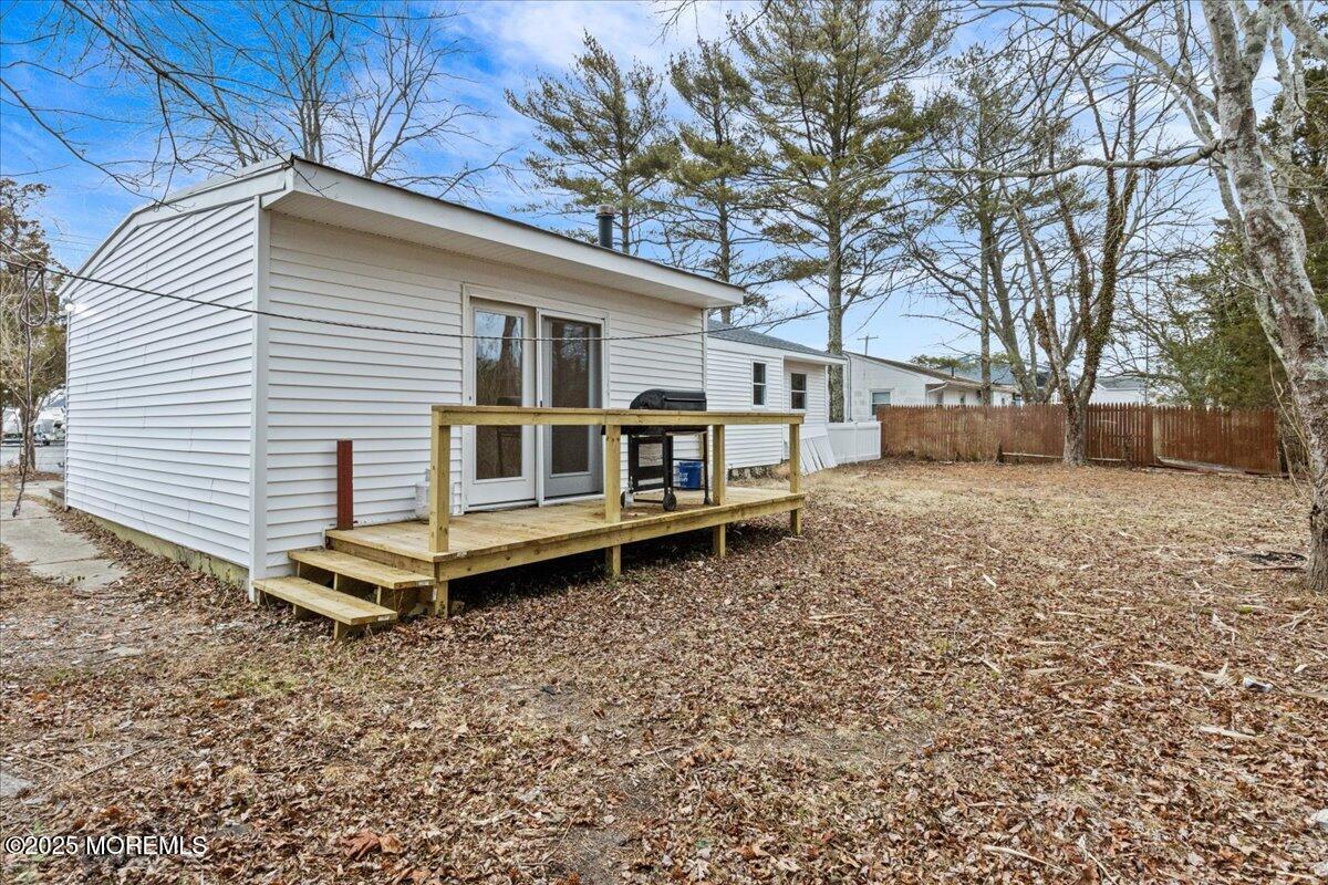 98 Marine Road Waretown, NJ 08758 - Photo 33 of 40 a house view with a backyard space