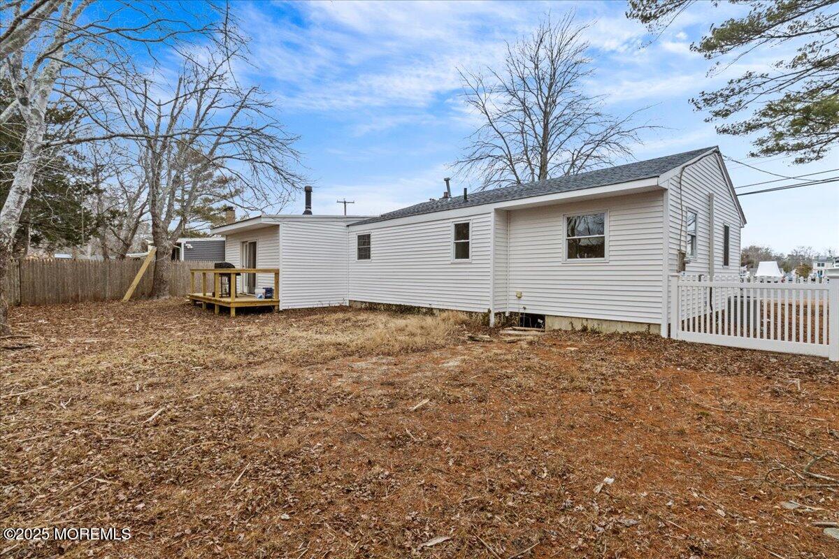 98 Marine Road Waretown, NJ 08758 - Photo 34 of 40 a house view with a backyard space