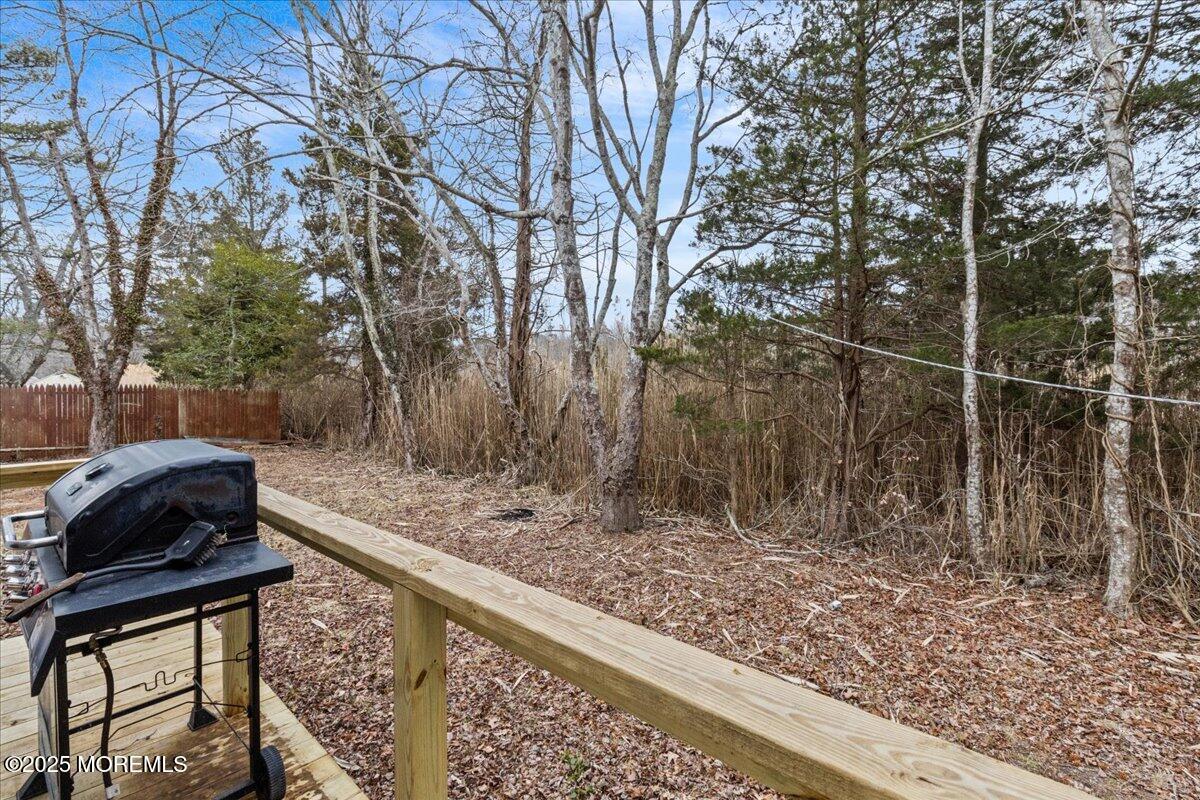 98 Marine Road Waretown, NJ 08758 - Photo 35 of 40 a view of a yard with large trees