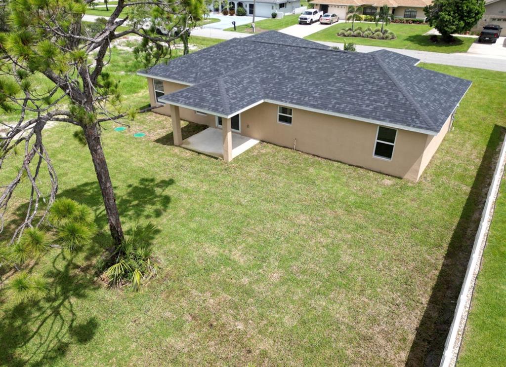 136 Lincoln Road Northwest Lake Placid, FL 33852 - Photo 29 of 31 a house view with a backyard space