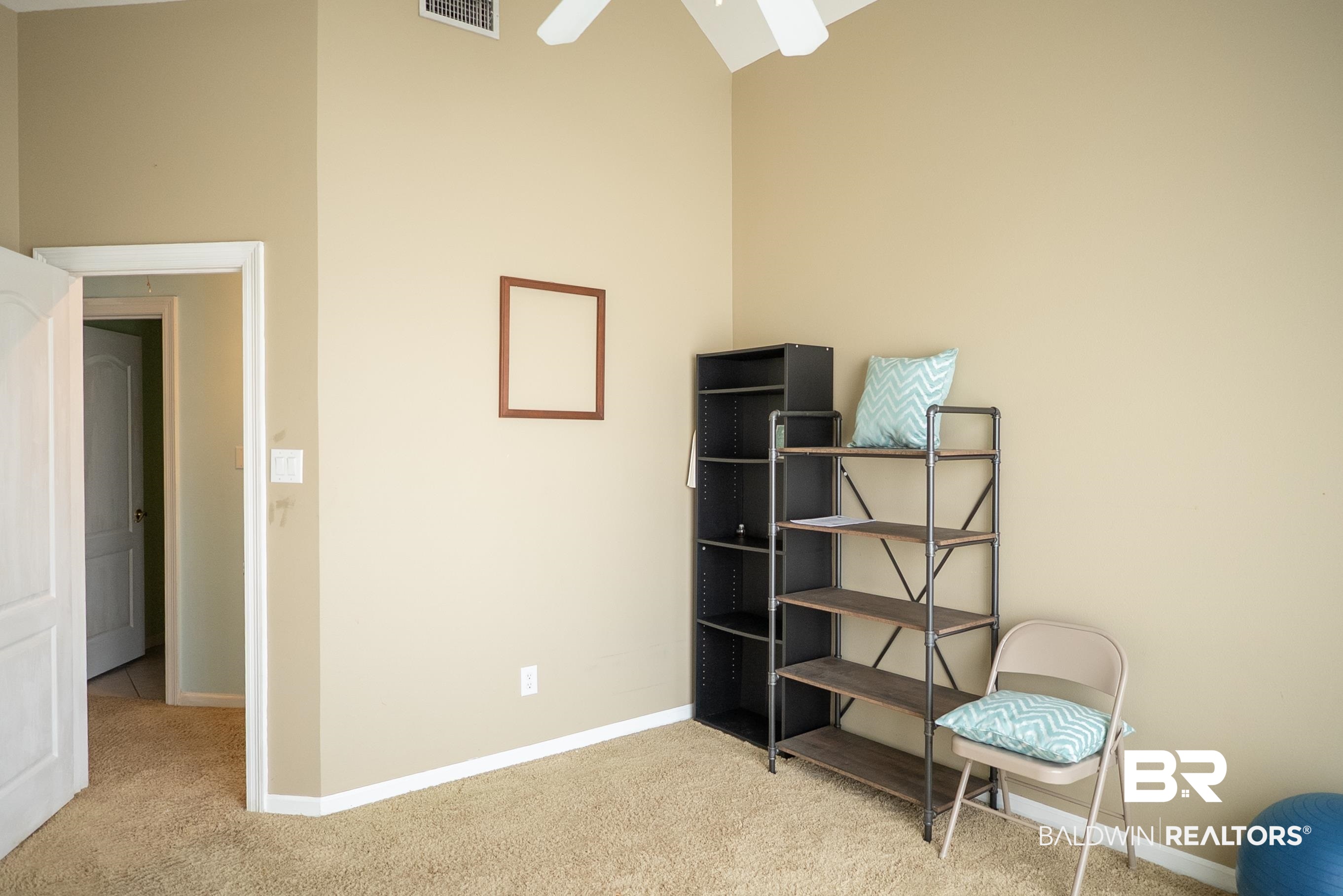 10023 Springfield Court Mobile, AL 36695 - Photo 24 of 50 Unfurnished room with light colored carpet and a towering ceiling