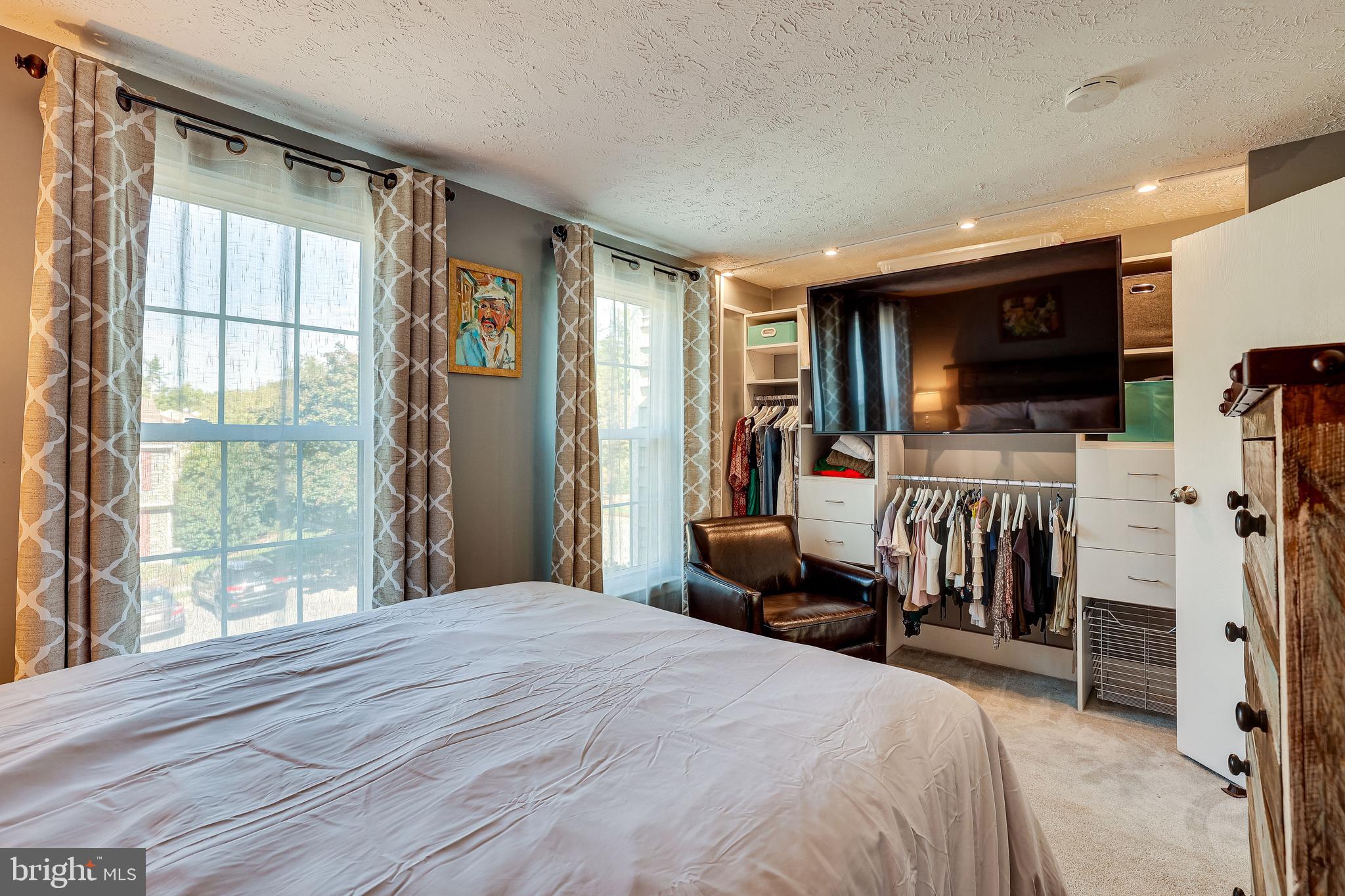 11922 Fieldthorn Court Reston, VA 20194 - Photo 22 of 40 Closet system with place to hang television