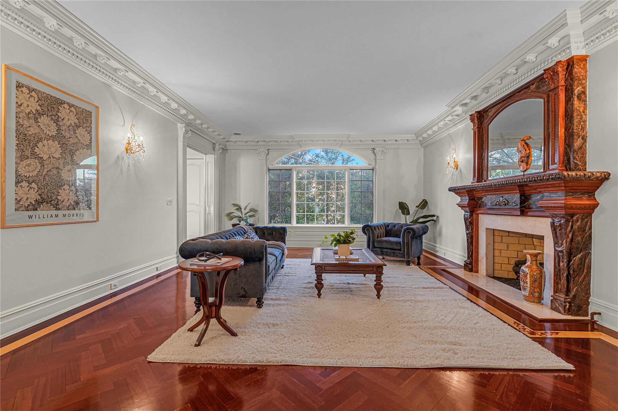 3 Point Crescent Queens, NY 11357 - Photo 7 of 38 Living room with ornamental molding, a tiled fireplace, and baseboards